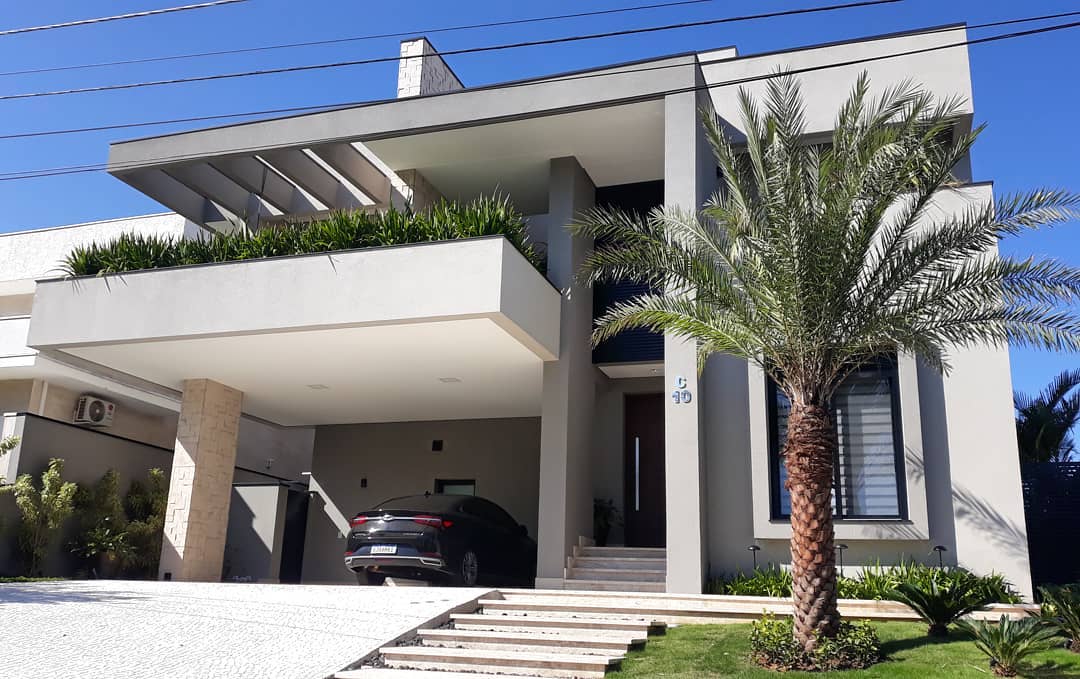 Residência contemporânea de alto padrão com paisagismo